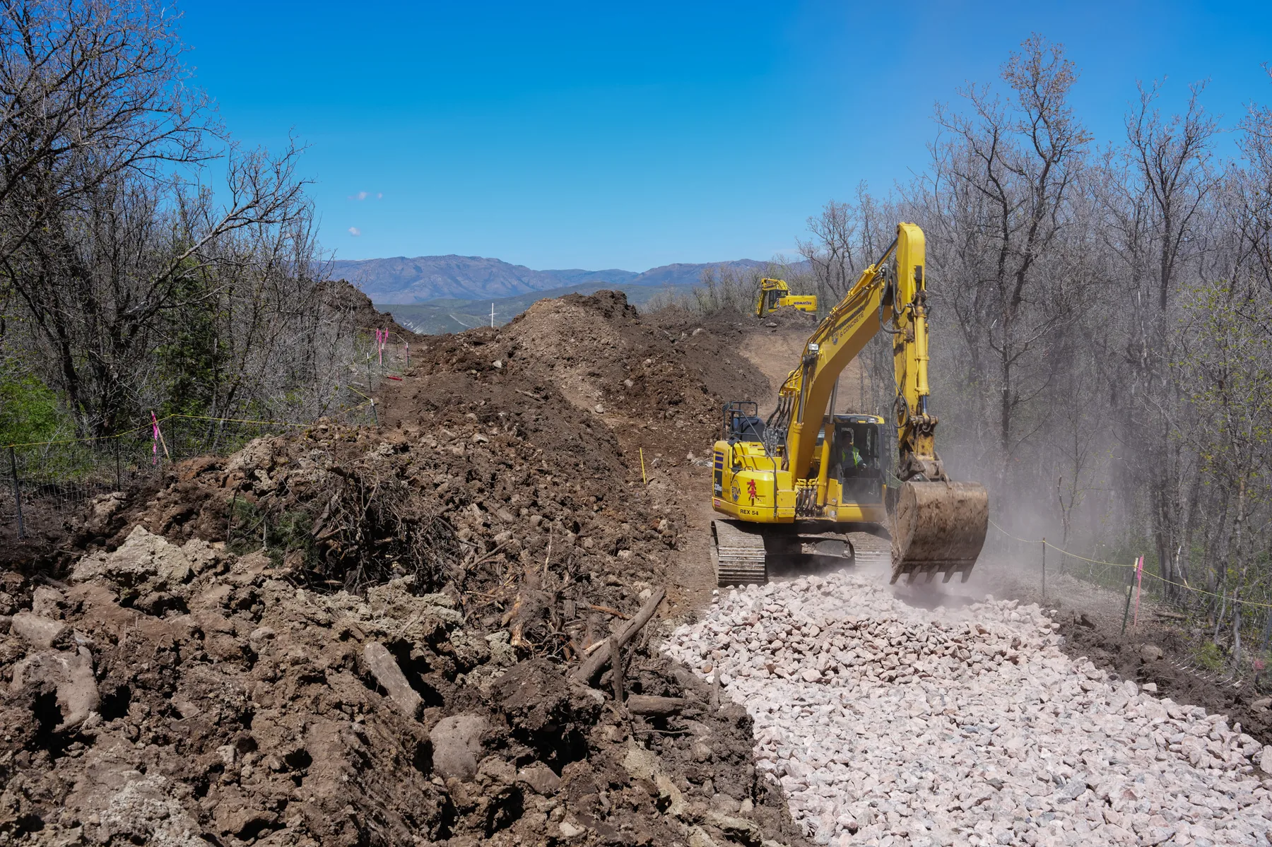 Excavation machine handling rough mountain sitework